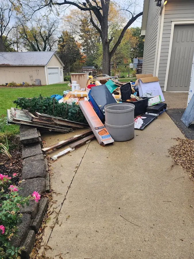 Dumpster being loaded with debris for 30 Yard Dumpster Rental in Rohnert Park